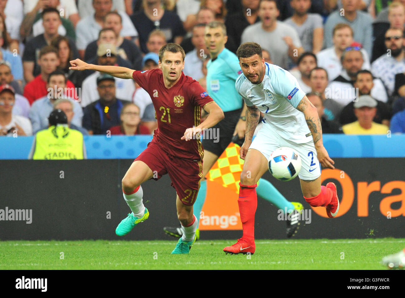 Marseille, France. 11th June, 2016. European Football Championships 2016. England versus Russia. KYLE WALKER (end) beats Georgi Schennikov (rus) Credit:  Action Plus Sports/Alamy Live News Stock Photo