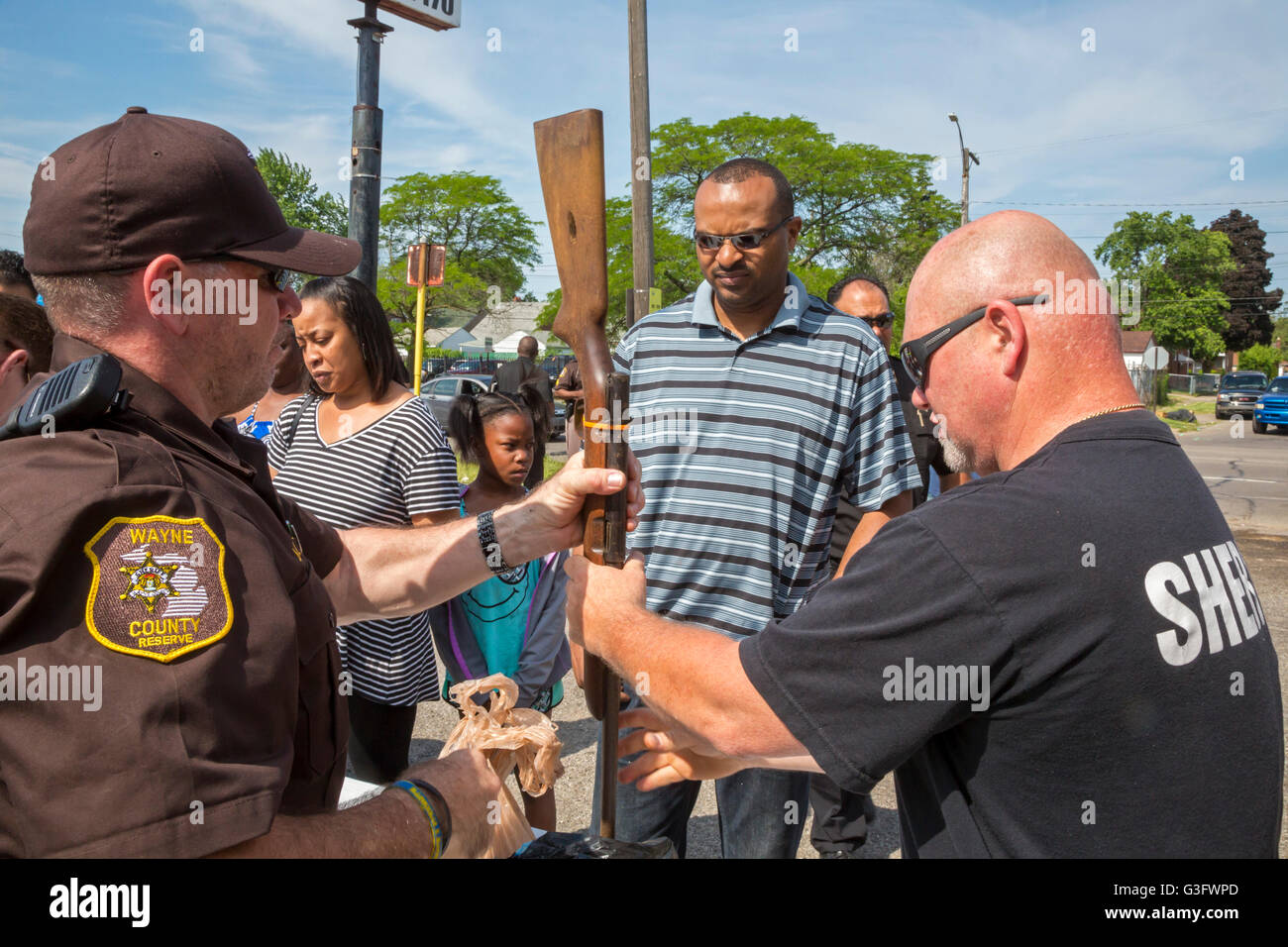 Detroit, Michigan USA - 11th June 2016 - People turn in old guns as the Wayne County sheriff offers $50 with no questions asked for each weapon surrendered. Credit:  Jim West/Alamy Live News Stock Photo