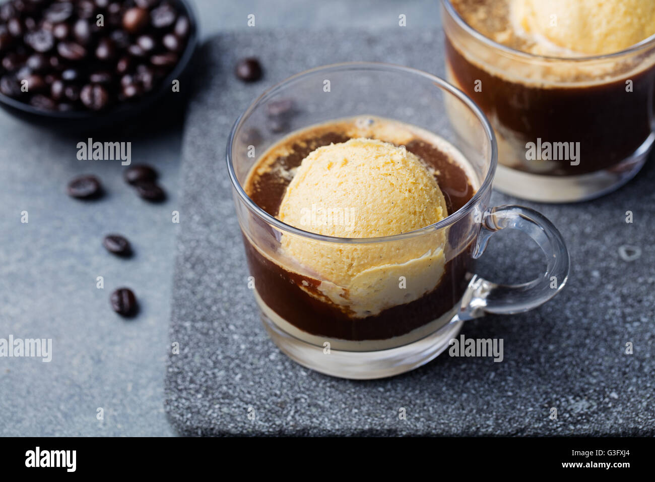https://c8.alamy.com/comp/G3FXJ4/affogato-coffee-with-ice-cream-on-a-glass-cup-G3FXJ4.jpg