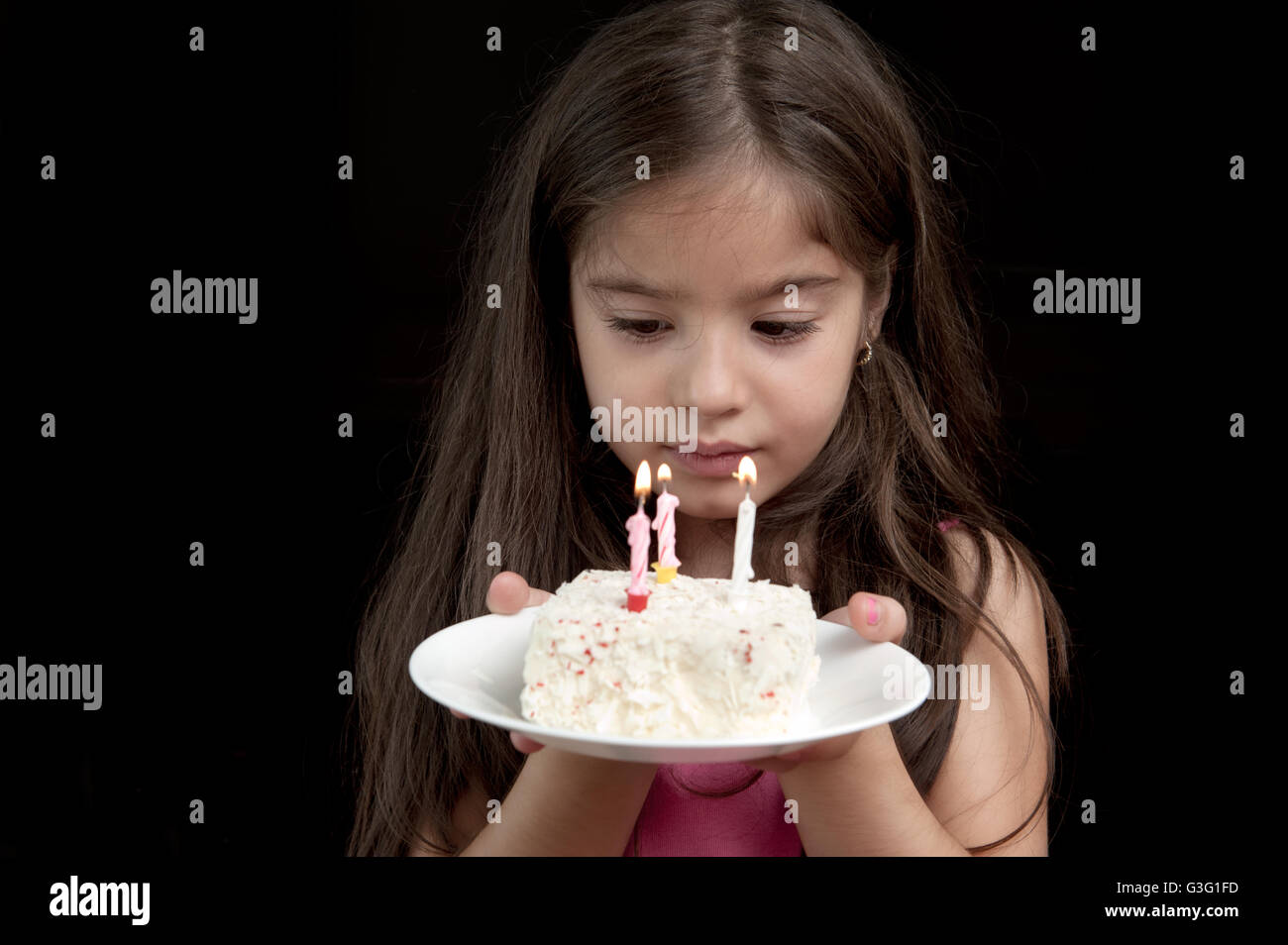 Girl holding birthday cake Stock Photo Alamy