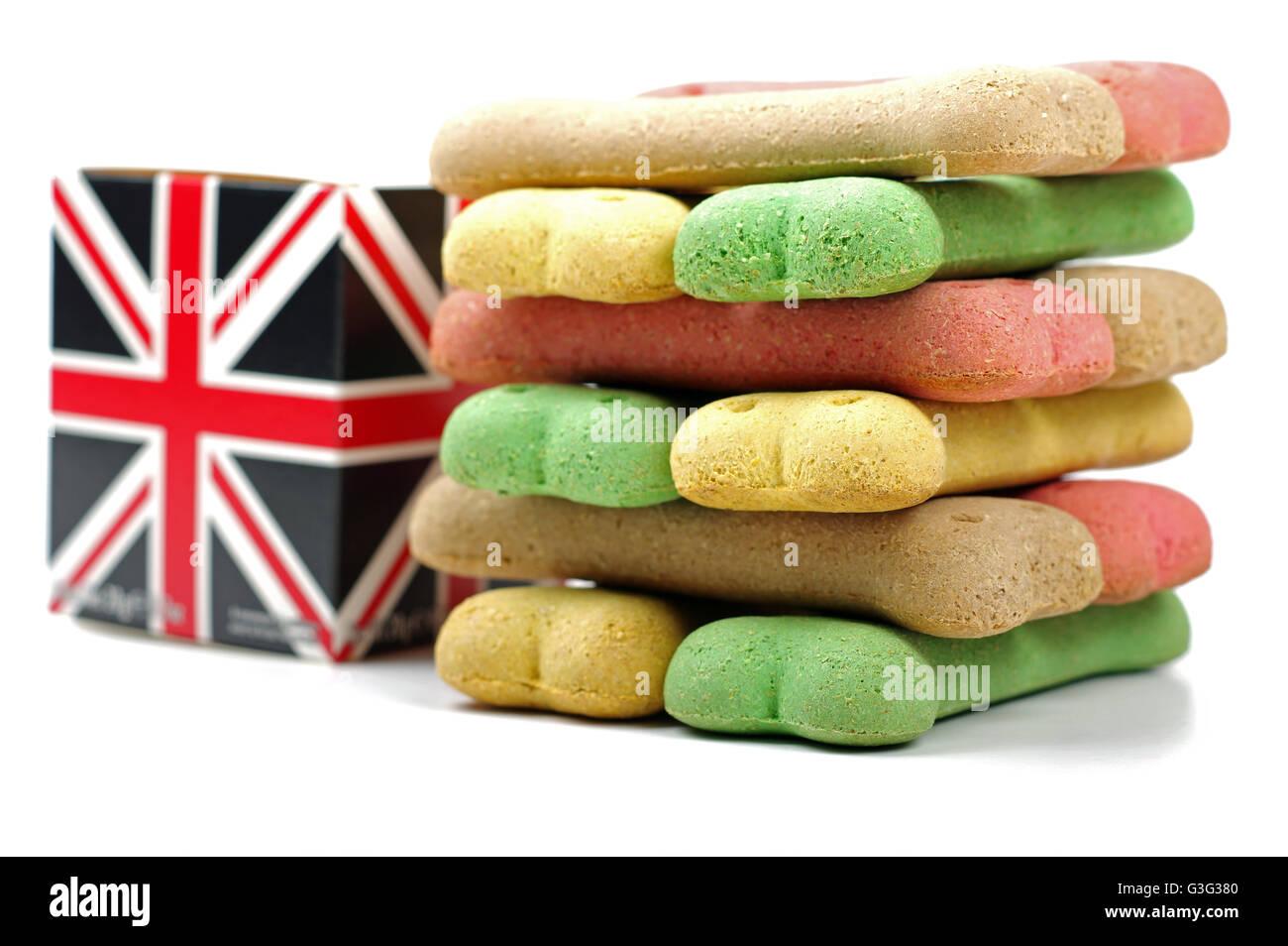 colored dog biscuits and a british flag box Stock Photo