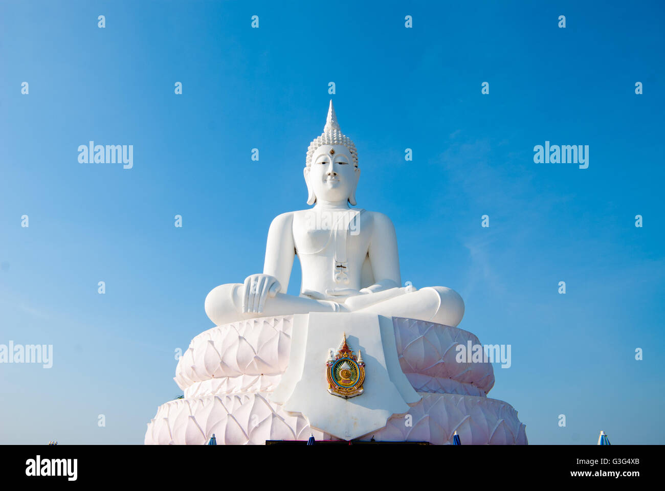 Big white Buddha statue and nice blue sky in Thailand Stock Photo - Alamy