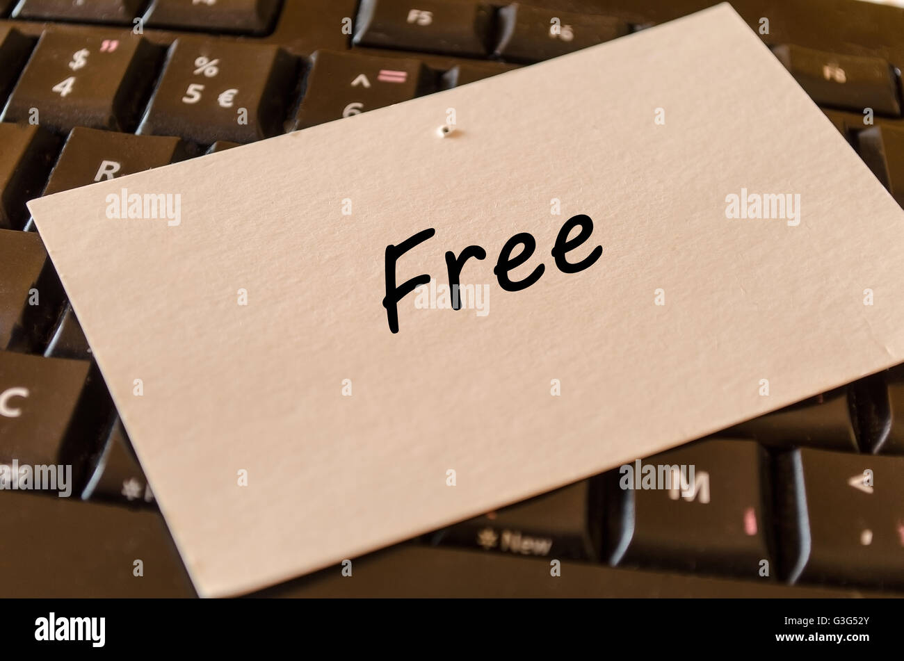 Free concept on black keyboard background Stock Photo
