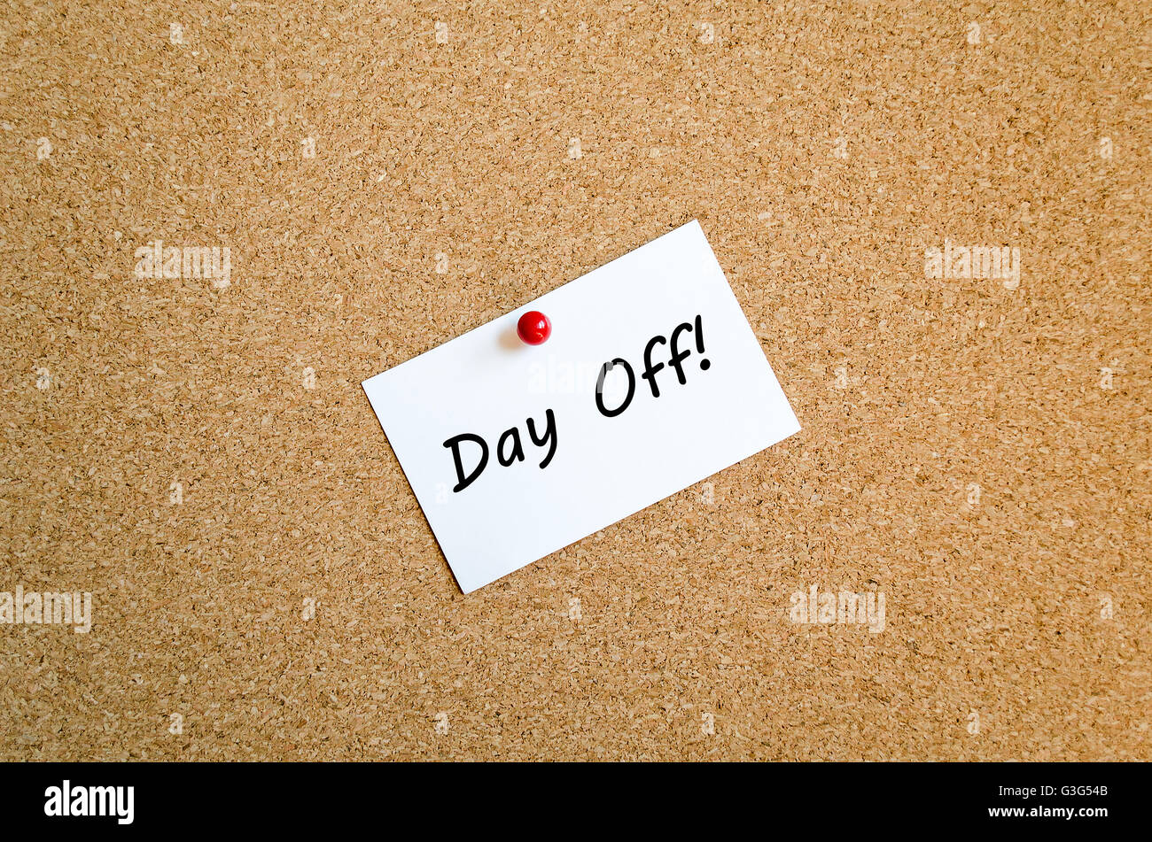 Sticky Note On Cork Board Background And Day Off Text Concept Stock Photo