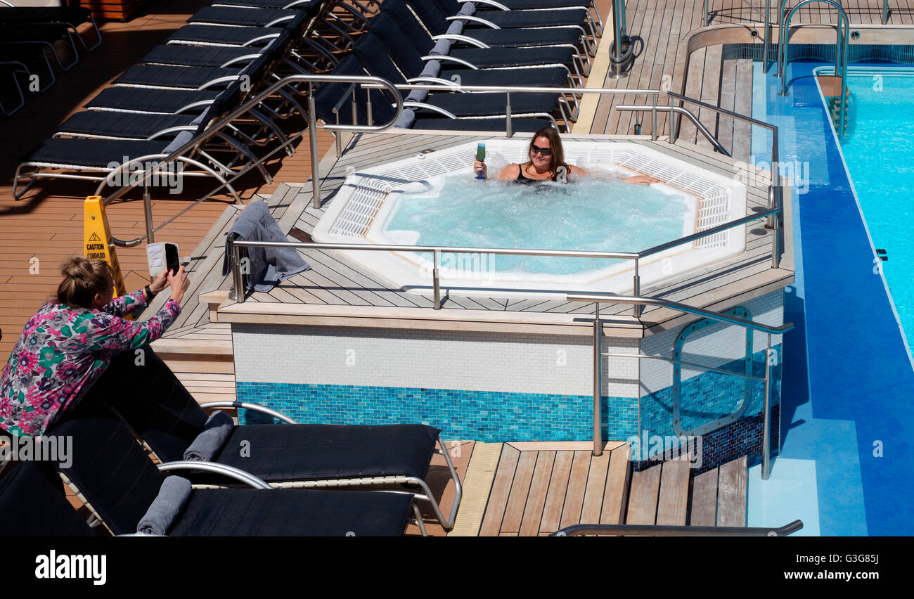Passenger takes a snap aboard luxury cruiseship Celebrity Silhouette Stock Photo
