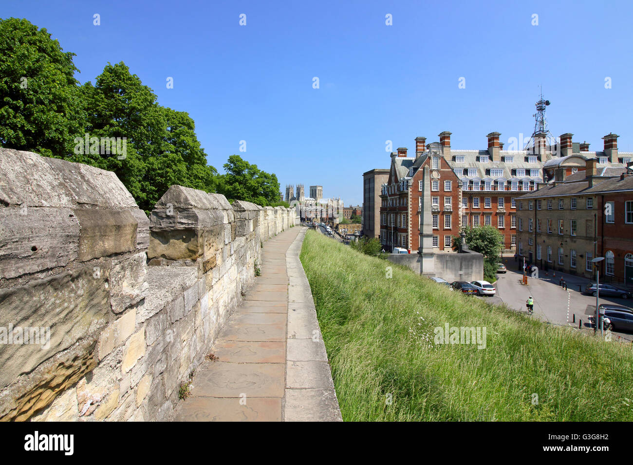 Hay meadow beneath the medieval walls of the historic city of York, known to the Vikings as Jorvik and by the Romans as Eboracum Stock Photo