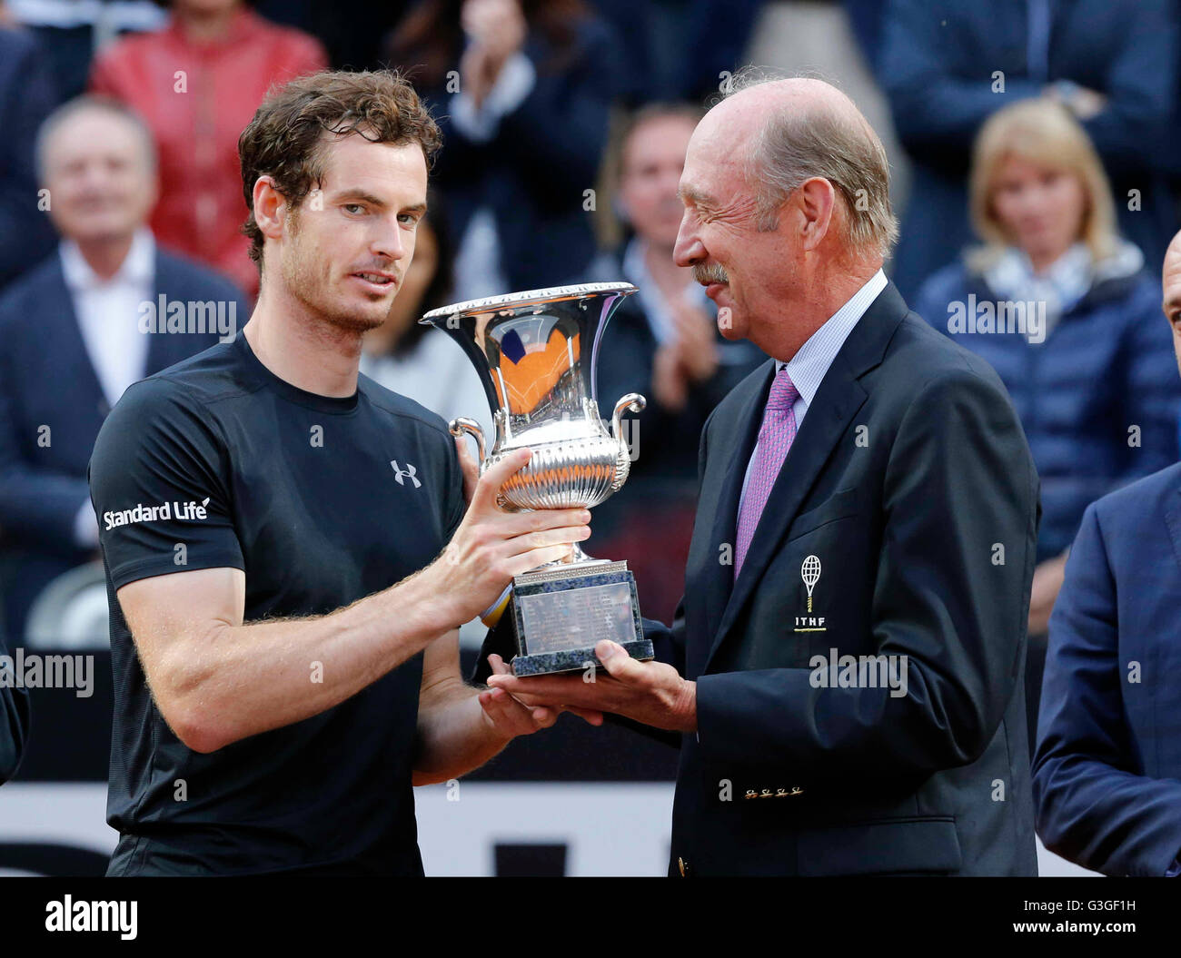 Rome, Italy. 15th May, 2016. The Tennis' legend Stan Smith (R) delivery the  trophy to Andy Murray (L) of Great Britain the winner the final match of  the Italian Open tennis BNL2016
