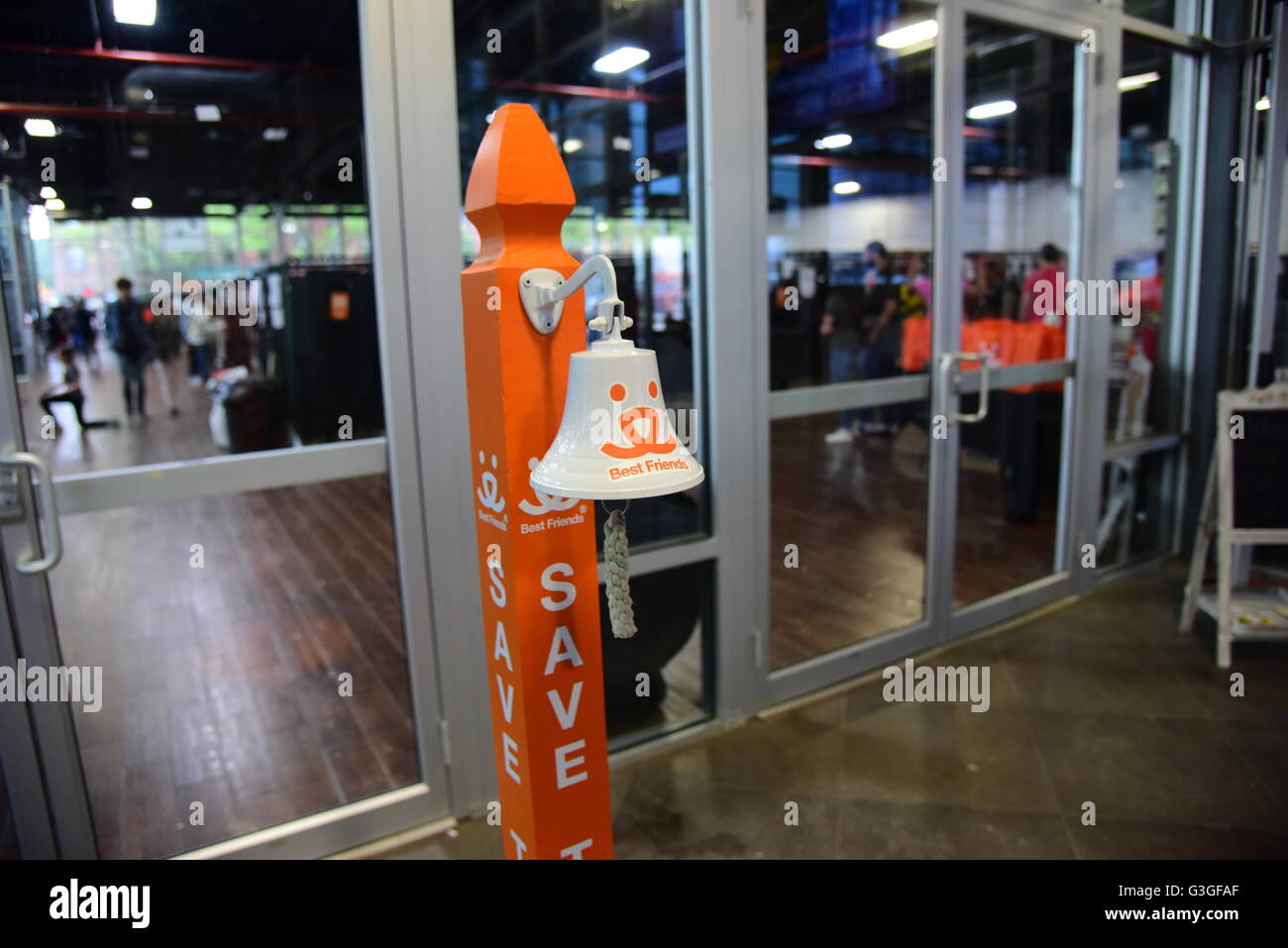 New York City, United States. 14th May, 2016. Adoption bell with Best Friends logo outside convention floor. Best Friends Animal Society held its annual spring adoption event, bringing together more than twenty pet rescue organizations into contact with people seeking to open their hearts & homes to an animal in need. © Andy Katz/Pacific Press/Alamy Live News Stock Photo