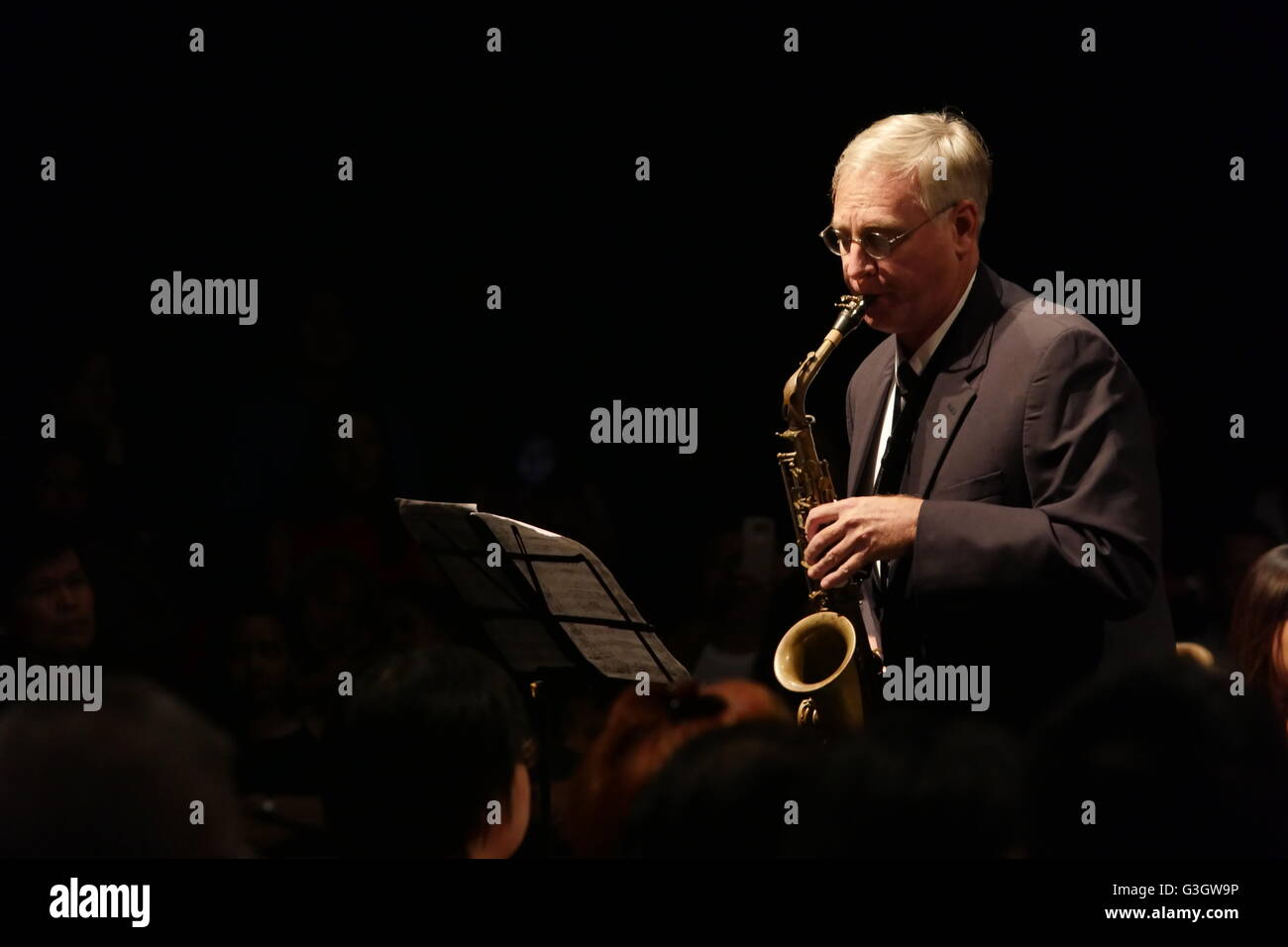 Brian Howrey on the saxophone, with the Manila Symphony Orchestra
