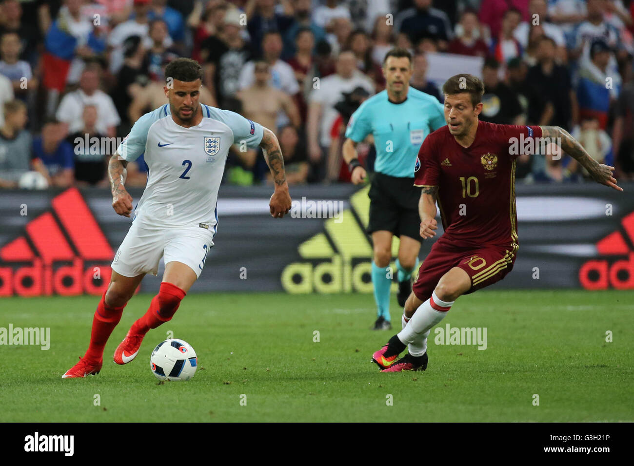 MARSEILLE- FRANCE, JUNE 2016 :Walker and Smolov in action  during football match  of Euro 2016  in France between England vs Russia at the Stade Velodrome   on June 11, 2016 in Marseille. Credit:  marco iacobucci/Alamy Live News Stock Photo