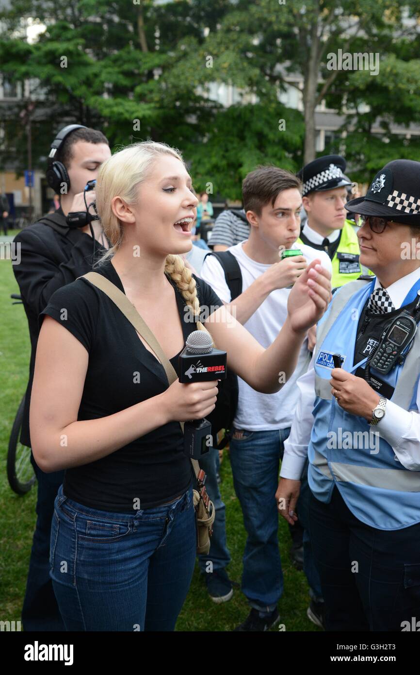 London, UK. 24 June, 2016. Pro-europe and migrant rally held in London.  Reporter argues with protesters following the minor scuffle. Credit:  Marc Ward/Alamy Live News Stock Photo