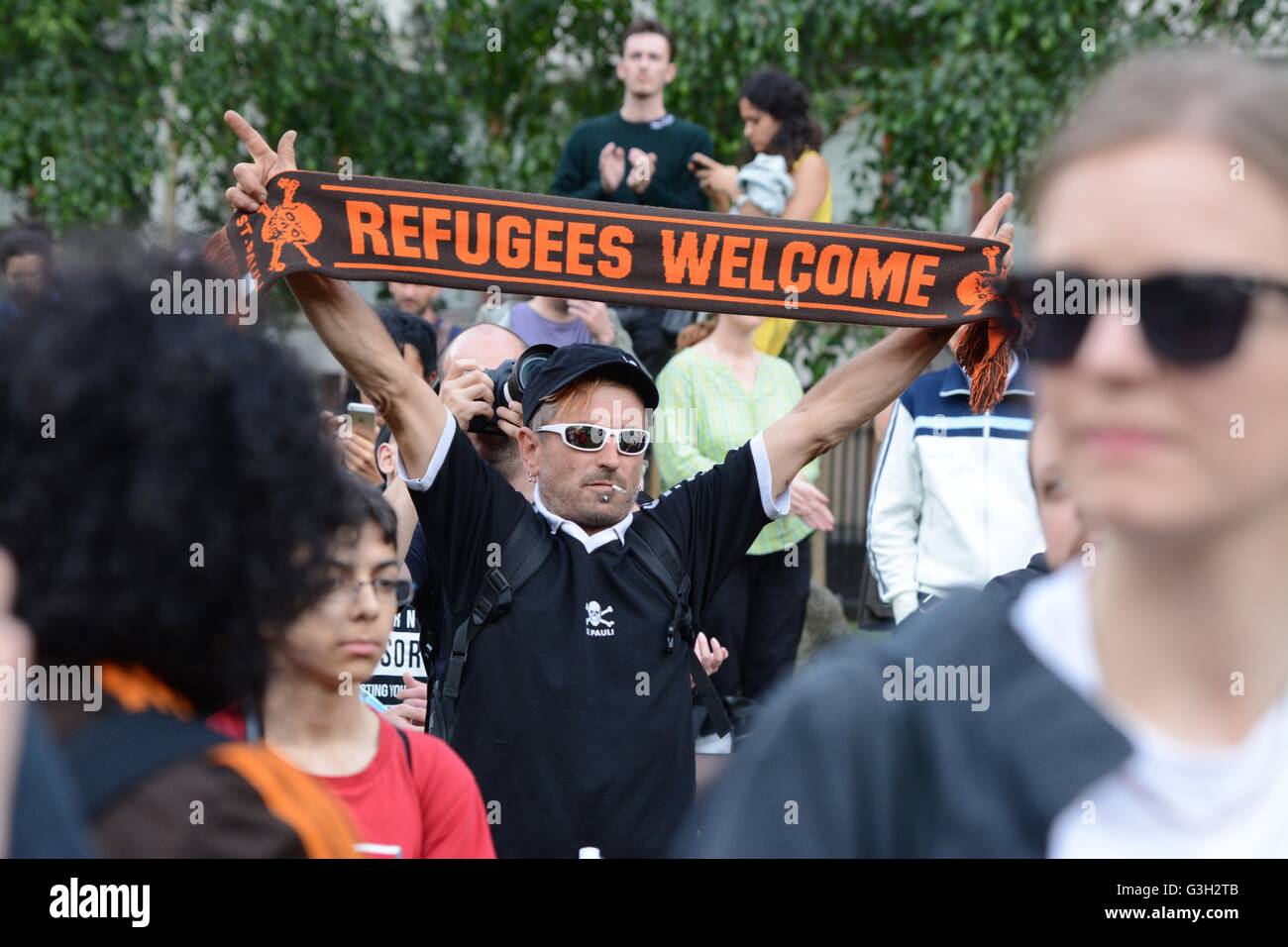London, UK. 24 June, 2016. Pro-europe and migrant rally held in London.  Refugees welcome scarf held aloft at the demo. Credit:  Marc Ward/Alamy Live News Stock Photo