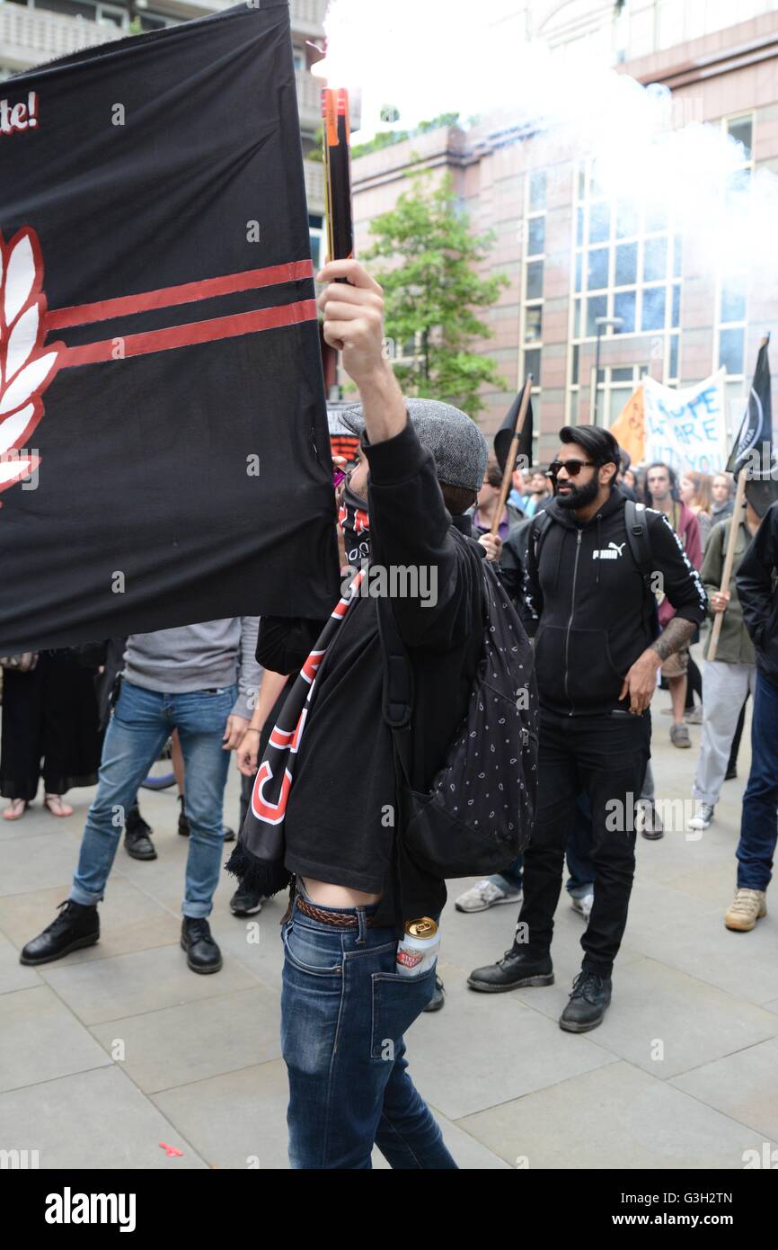 London, UK. 24 June, 2016. Pro-europe and migrant rally held in London.  Flare and a Stella: protesters were seen to be drinking large amounts of alochol during the march. Credit:  Marc Ward/Alamy Live News Stock Photo