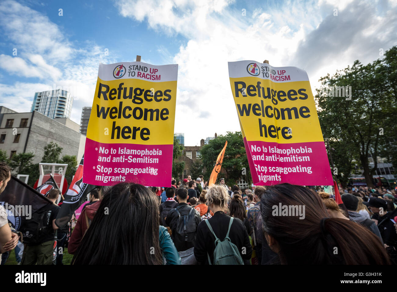 London, UK. 24th June, 2016. 'Refugees Welcome Here'. Defend All Migrants. A post EU referendum protest led by a few hundred pro-refugee protesters and anti-government anarchist groups marched from Aldgate in east London to News UK HQ in London Bridge Credit:  Guy Corbishley/Alamy Live News Stock Photo