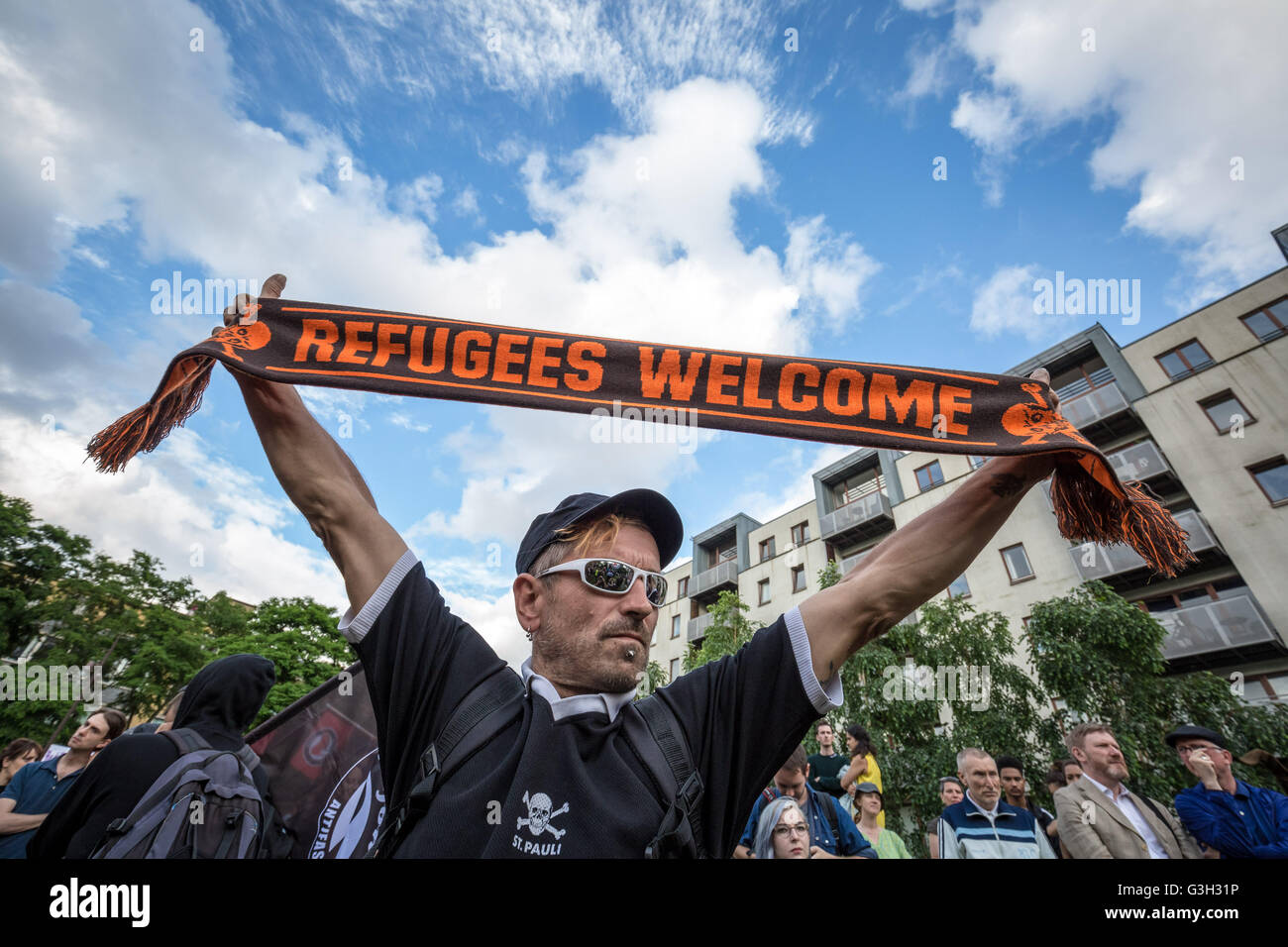 London, UK. 24th June, 2016. 'Refugees Welcome' banner. Defend All Migrants. A post EU referendum protest led by a few hundred pro-refugee protesters and anti-government anarchist groups marched from Aldgate in east London to News UK HQ in London Bridge Credit:  Guy Corbishley/Alamy Live News Stock Photo