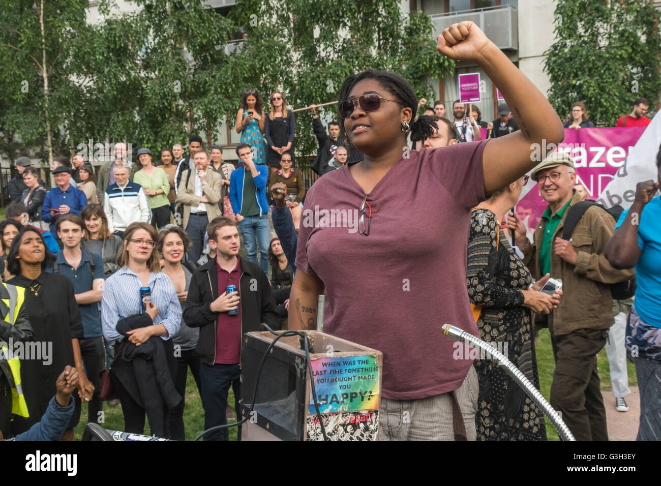 London, UK. June 24th 2016. A Black activist makes the closing speech at the rally in Altab Ali Park on the day after the UK voted to leave the EU against racism, for migrant rights and against fascist violence. They say that migration and immigrants have been attacked and scapegoated not only by both Remain and Leave campaigns but by mainstream parties and media over more than 20 years, stoking up hatred by insisting immigrants are a 'problem'. Peter Marshall/Alamy Live News Stock Photo