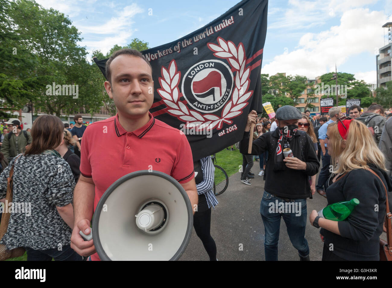 London, UK. June 24th 2016. After a rally in Altab Ali Park, well over a thousand protesters set off on a long march to the offices of News International on the day after the UK voted to leave the EU. They were protesting against racism, for migrant rights and against fascist violence and argue that migration and immigrants have been attacked and scapegoated not only by both Remain and Leave campaigns but by mainstream parties and media over more than 20 years, stoking up hatred by insisting immigrants are a 'problem'. Peter Marshall/Alamy Live News Stock Photo