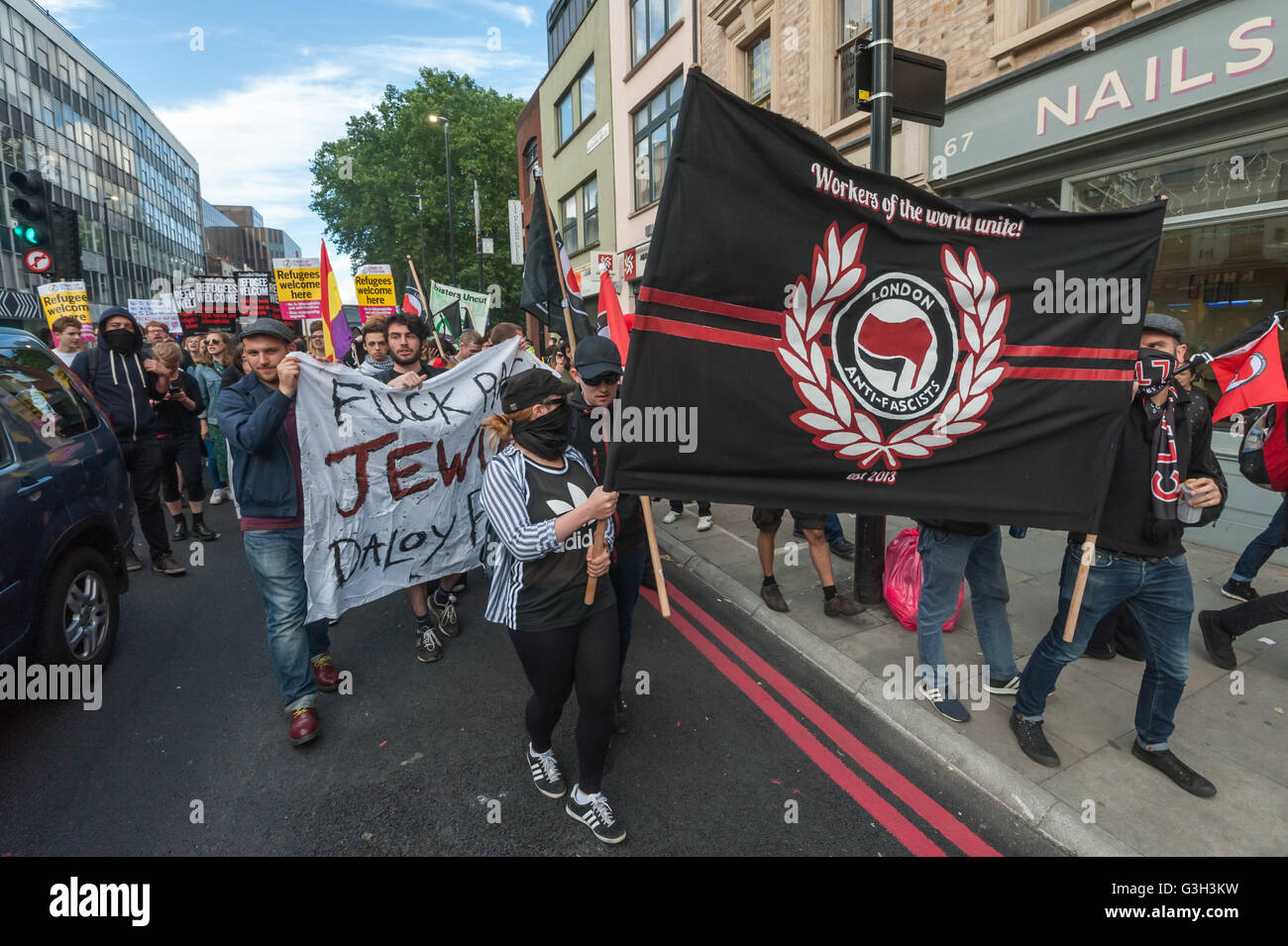 London, UK. June 24th 2016. After a rally in Altab Ali Park, well over a thousand protesters marched to the offices of News International on the day after the UK voted to leave the EU. They were protesting against racism, for migrant rights and against fascist violence and argue that migration and immigrants have been attacked and scapegoated not only by both Remain and Leave campaigns but by mainstream parties and media over more than 20 years, stoking up hatred by insisting immigrants are a 'problem'. Peter Marshall/Alamy Live News Stock Photo