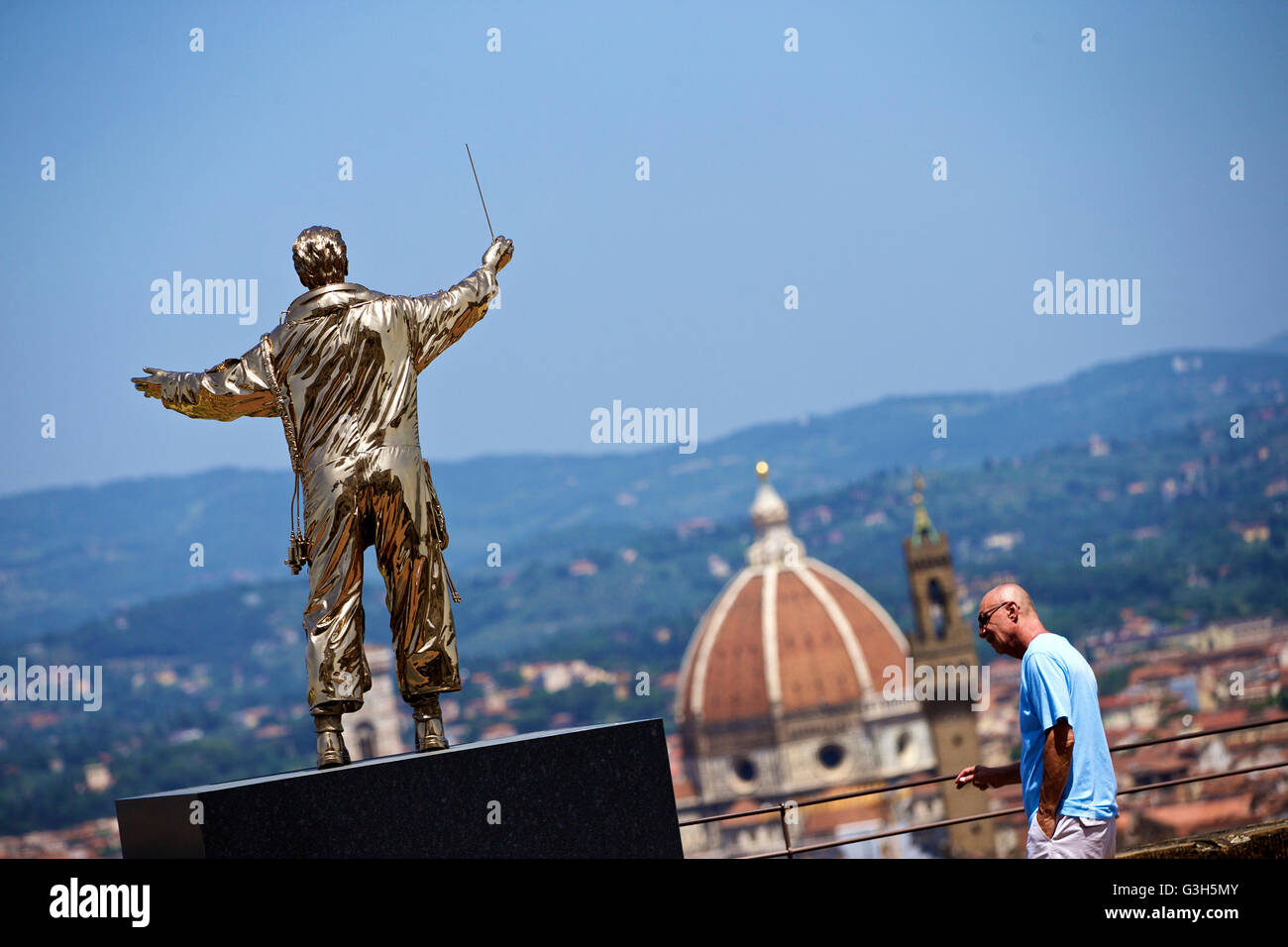 Florence, Italy. 24th June, 2016. A visitor looks at the exhibit 'The Man Who Conducts the Stars' at the Forte Belvedere in Florence, Italy, on June 24, 2016. Roughly one hundred of Belgian contemporary artist Jan Fabre's works dating from 1978 to 2016 were on display, including bronze and wax sculptures, performance films and works made of wing cases of the jewel scarab. © Jin Yu/Xinhua/Alamy Live News Stock Photo