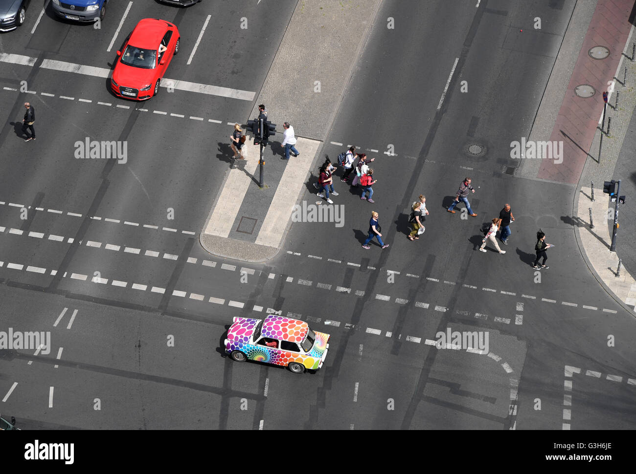 View on the crossroad at Leipziger Strasse/Stresemannstrasse across which drives a Trabi, seen from Potsdamer Platz in Berlin, germany, 10 June 2016. Photo: Jens Kalaene/dpa Stock Photo