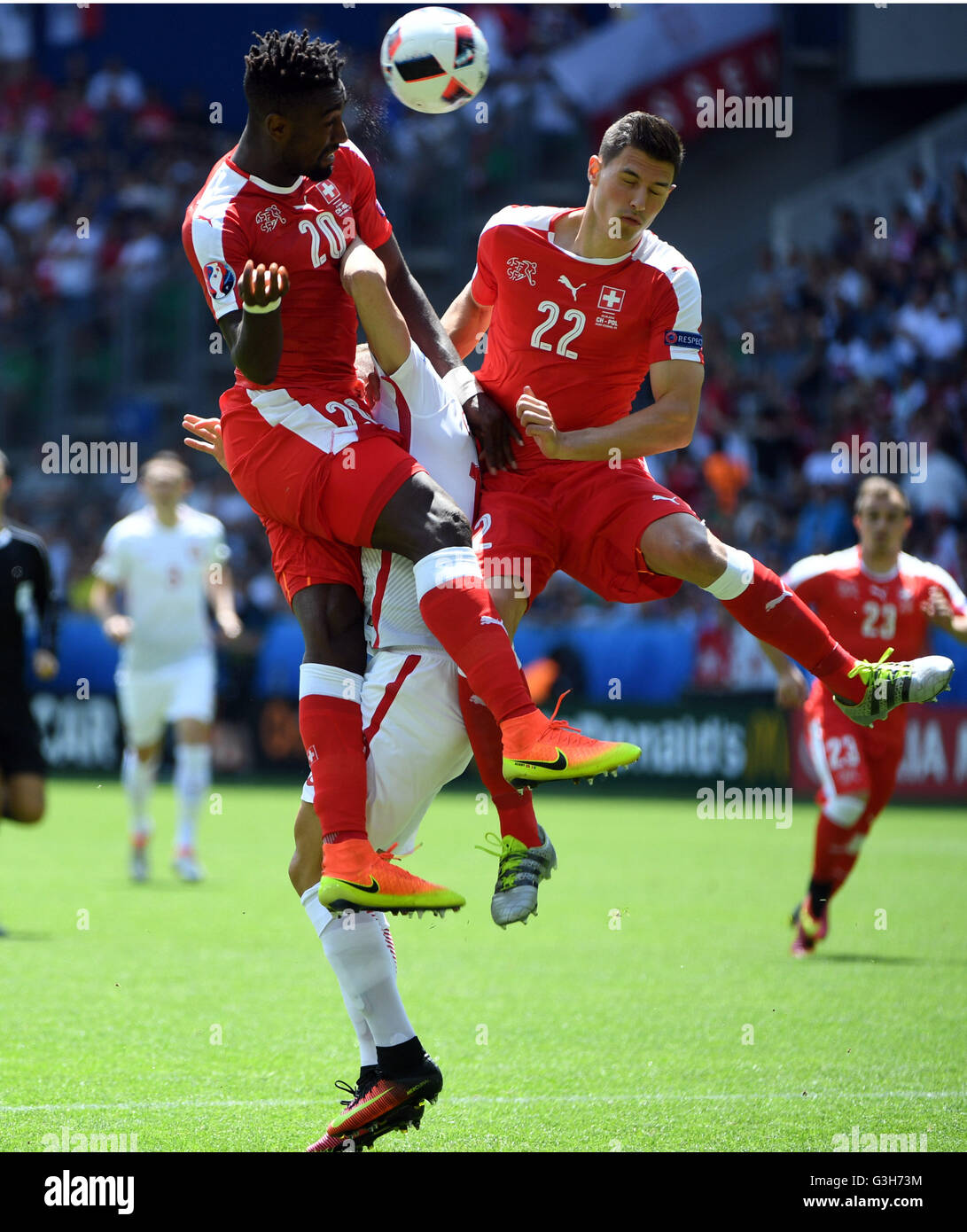 Saint-Etienne, France. 25th June, 2016. Switzerland's Fabian Schar(R) and Johan Djourou compete during the Euro 2016 round of sixteen football match between Switzerland and Poland in Saint-Etienne on June 25, 2016. Credit:  Xinhua/Alamy Live News Stock Photo