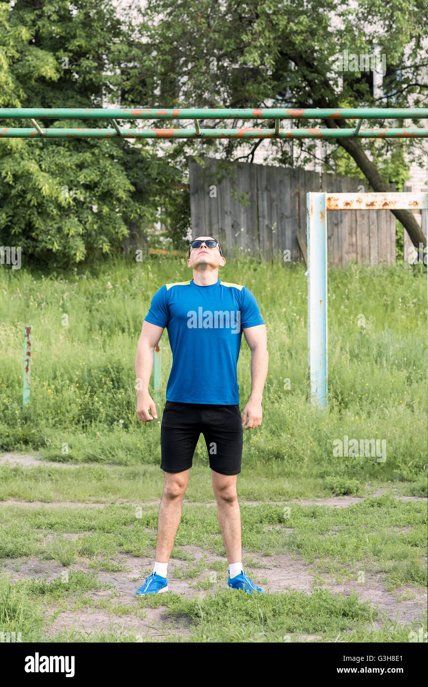 Athlete pushed on bars hi-res stock photography and images - Alamy