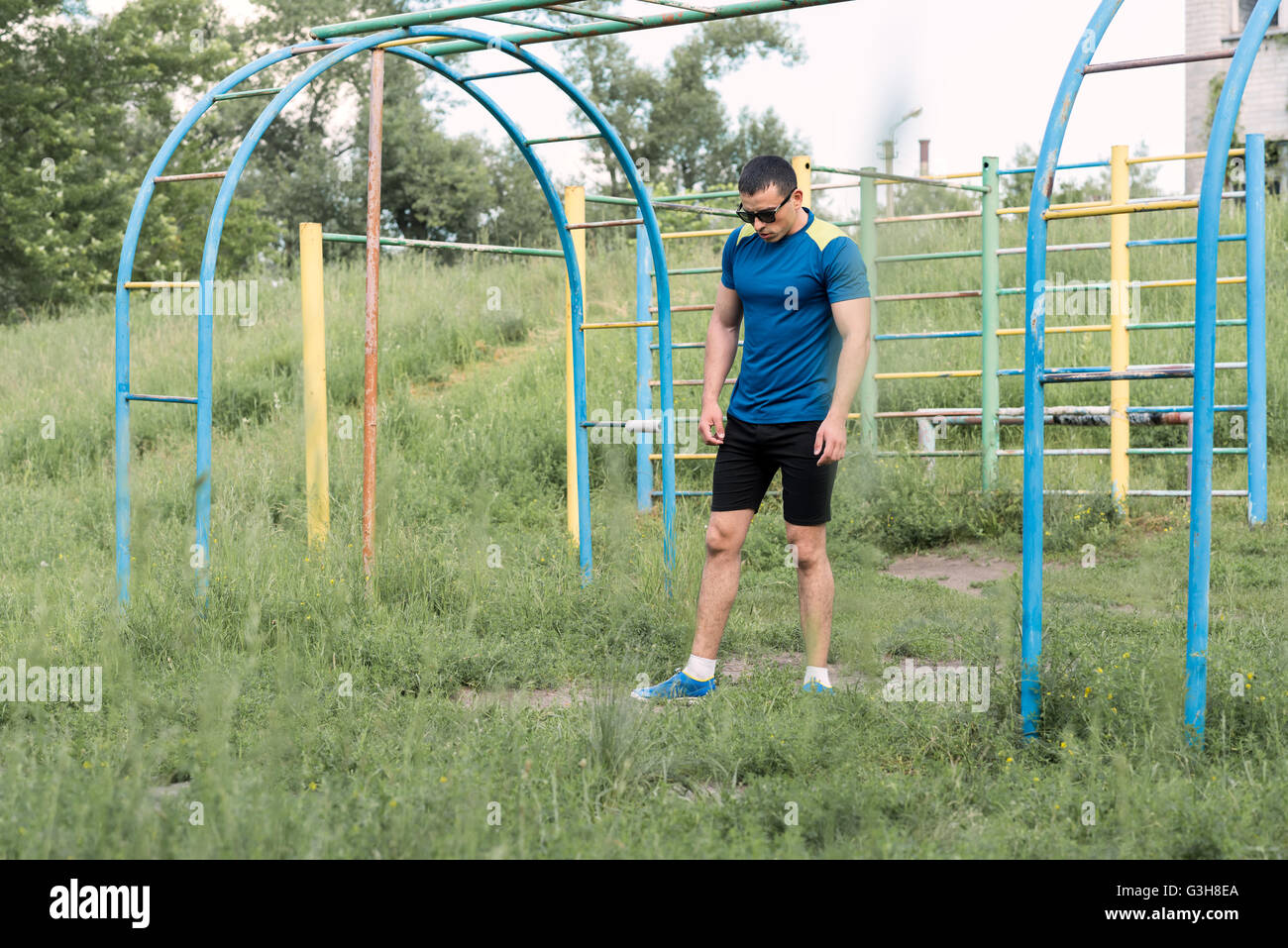 Athlete pushed on bars hi-res stock photography and images - Alamy