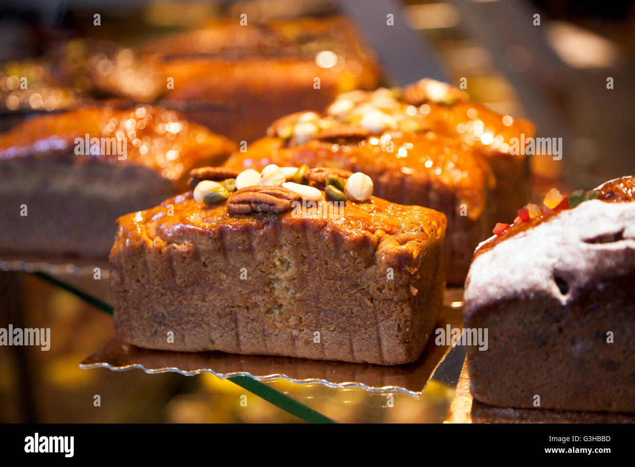 Little cakes topped with nuts Stock Photo