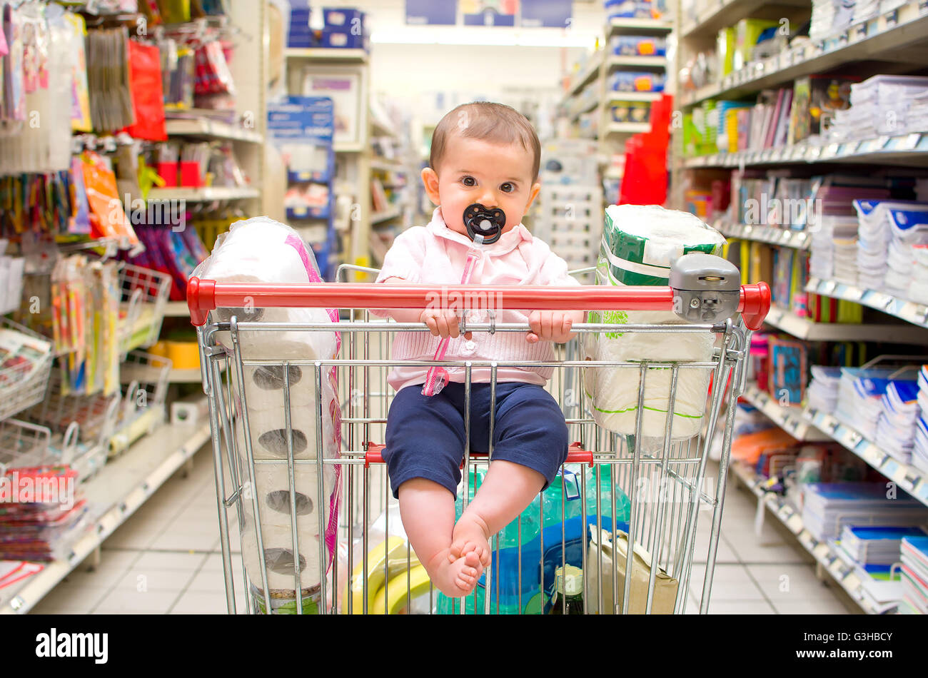 baby shopping cart newborn Stock Photo