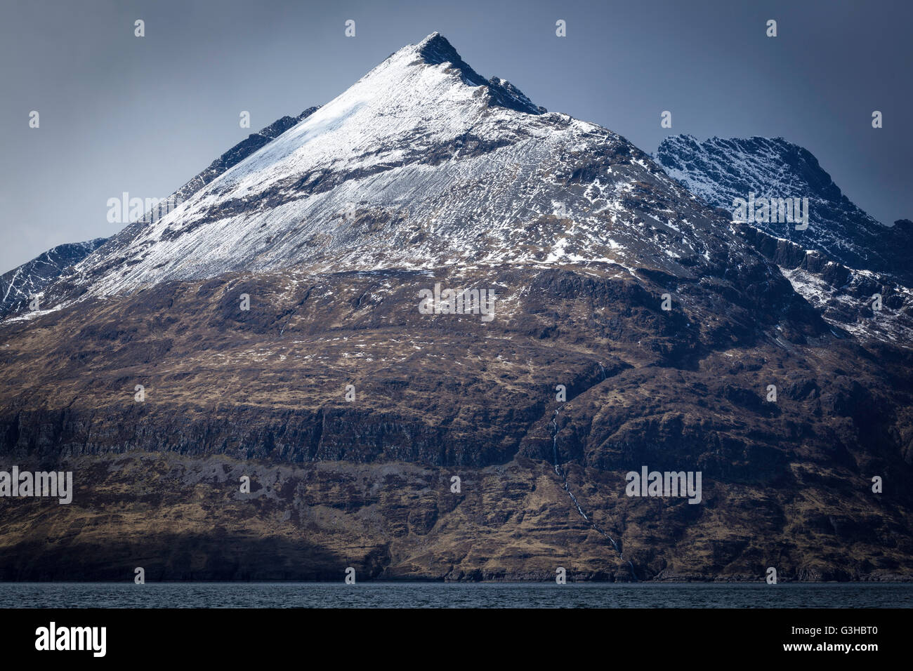 Snow covered summit of Gars - Bheinn, Cuillin Ridge, Elgol, Isle of Skye, Scotland Stock Photo