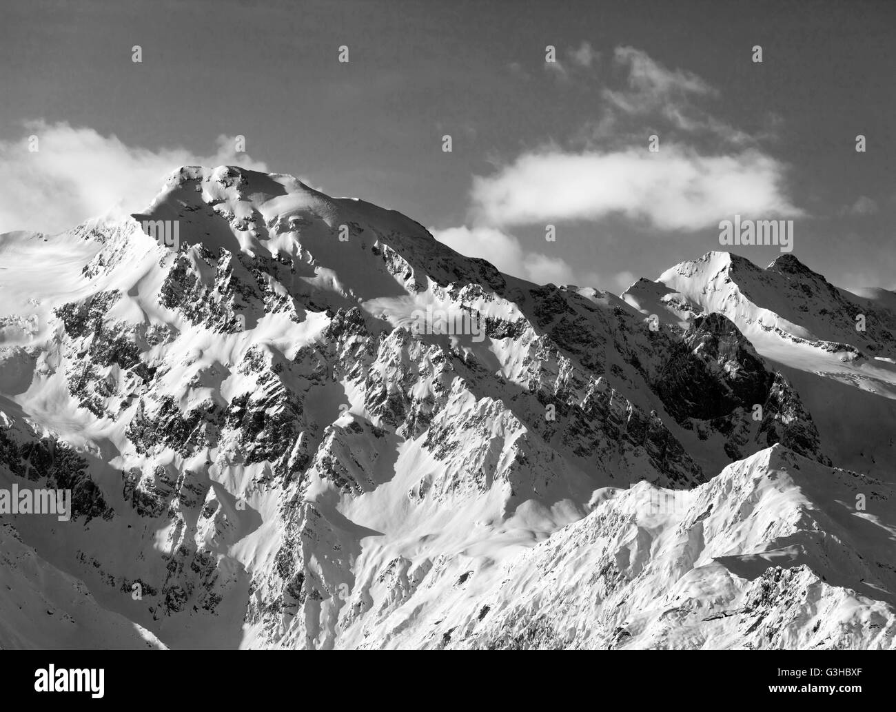 Black and white snowy mountains. Caucasus Mountains. Georgia, region Svaneti. Stock Photo