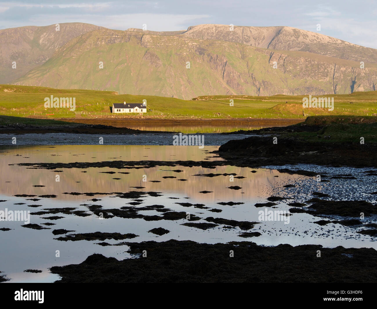 White house on Sanday from Canna, Scotland Stock Photo