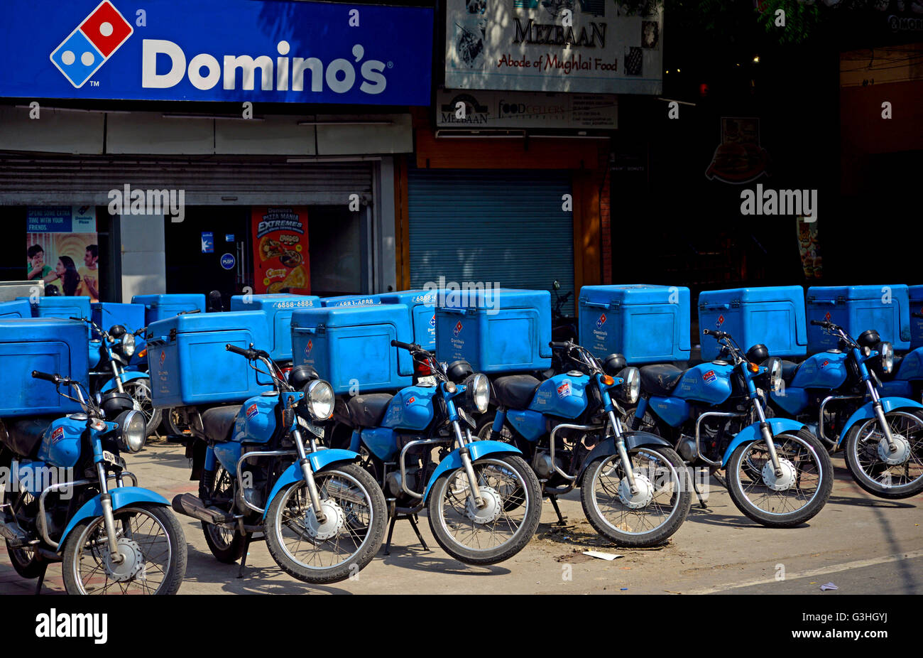 Domino's Restaurant With Delivery bikes Stock Photo
