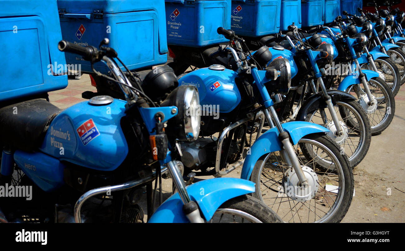 Domino's Delivery bikes  In a Row Stock Photo