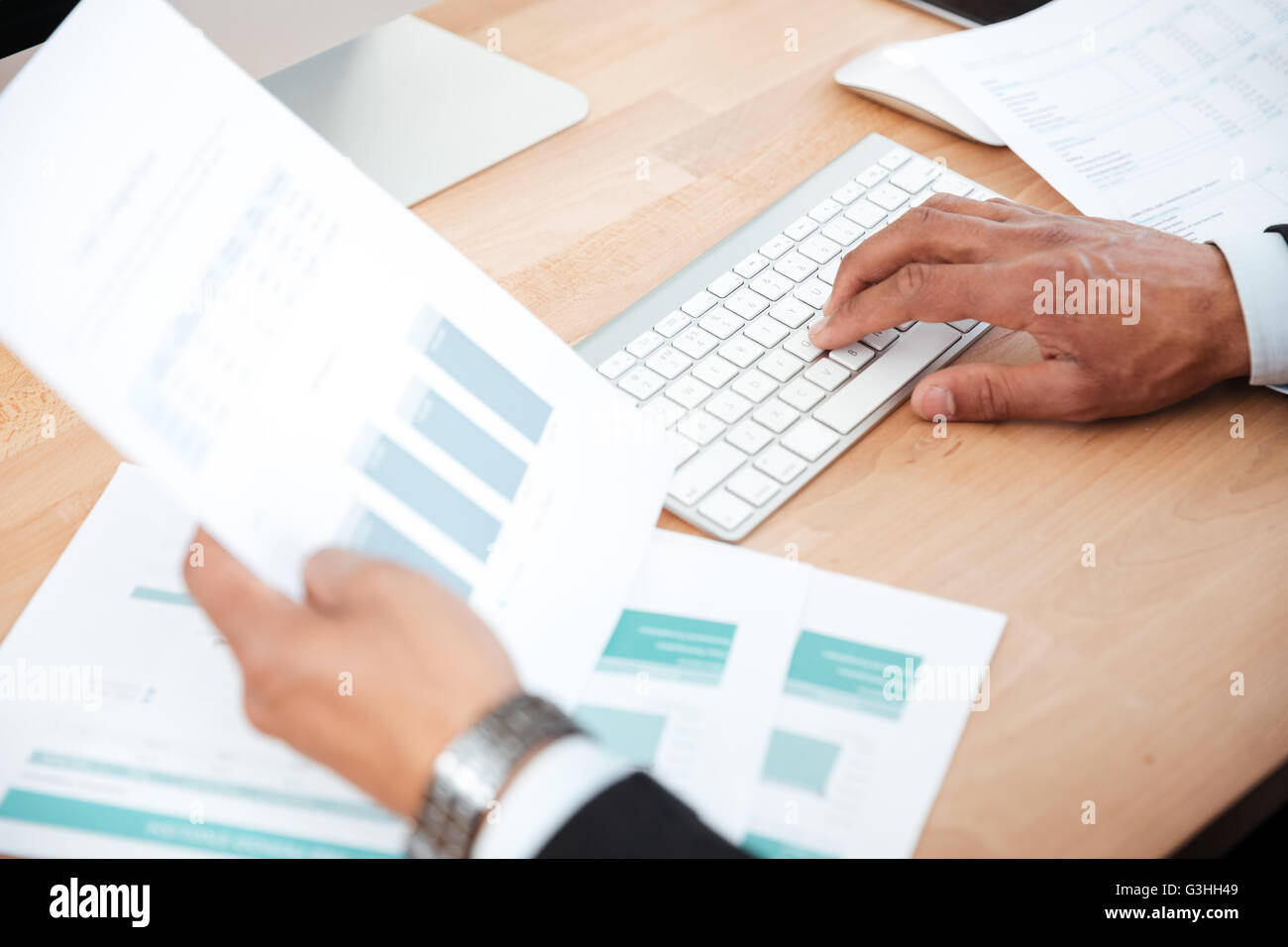 Close up hands holding typing hi-res stock photography and images - Alamy