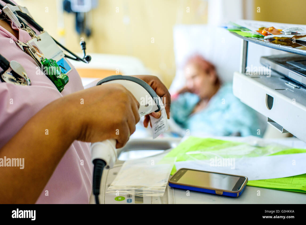 Nurse using stethoscope on patient hi-res stock photography and images ...