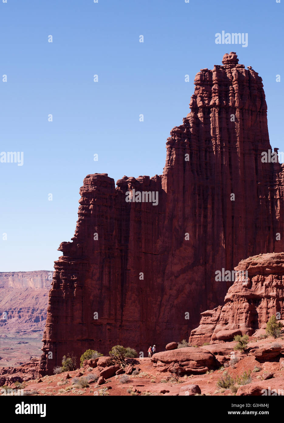 Hikers at Fisher Towers, Moab, Utah, USA Stock Photo
