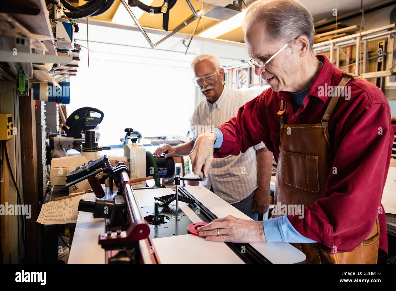 Senior men working with carpentry equipment workshop Stock Photo