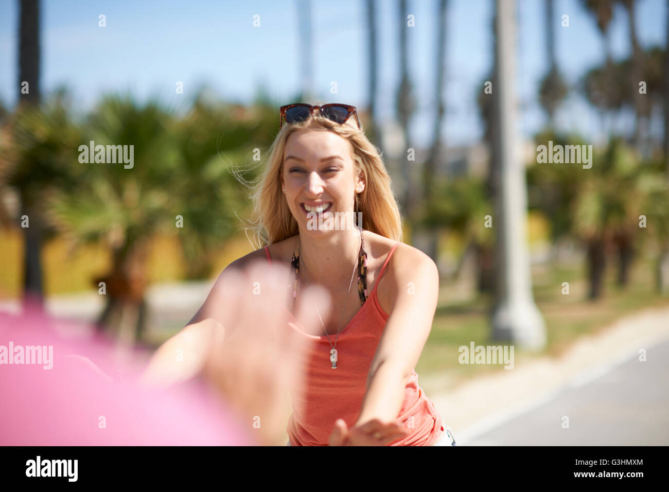 Young woman, outdoors, smiling Stock Photo