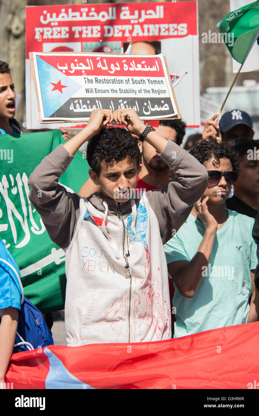 New York, United States. 18th Apr, 2016. Demonstrators wave flags and chant while participating in the rally. Amid the delay of United Nations-brokered peace talks between ex-Yemeni President Ali Abdullah Saleh and Houthi representatives due to have begun in Kuwait, and continued military engagement of Houthi-forces by a Saudi-led coalition; demonstrators gathered in Dag Hammarskjold Plaza near UN HQ in New York City to demand restoration of independence for South Yemen in solidarity with similar protests in Aden, Yemen over the past two days. © Albin Lohr-Jones/Pacific Press/Alamy Live News Stock Photo