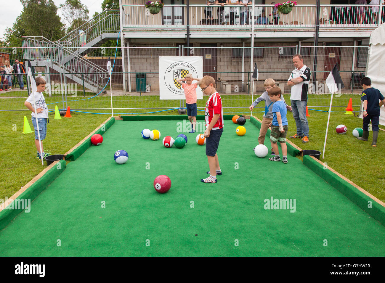 PoolBall pool being played on a small football pitch at the Alresford Festival 2016 Stock Photo