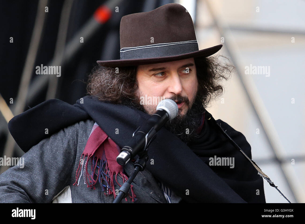 The singer Vinicio Capossela during rehearsals in San Carlo Square in Turin for New Year's concert. Vinicio Capossela is an Italian singer-songwriter. His style is strongly influenced by US singer and songwriter Tom Waits, though it also draws from the traditions of Italian folk music. Stock Photo