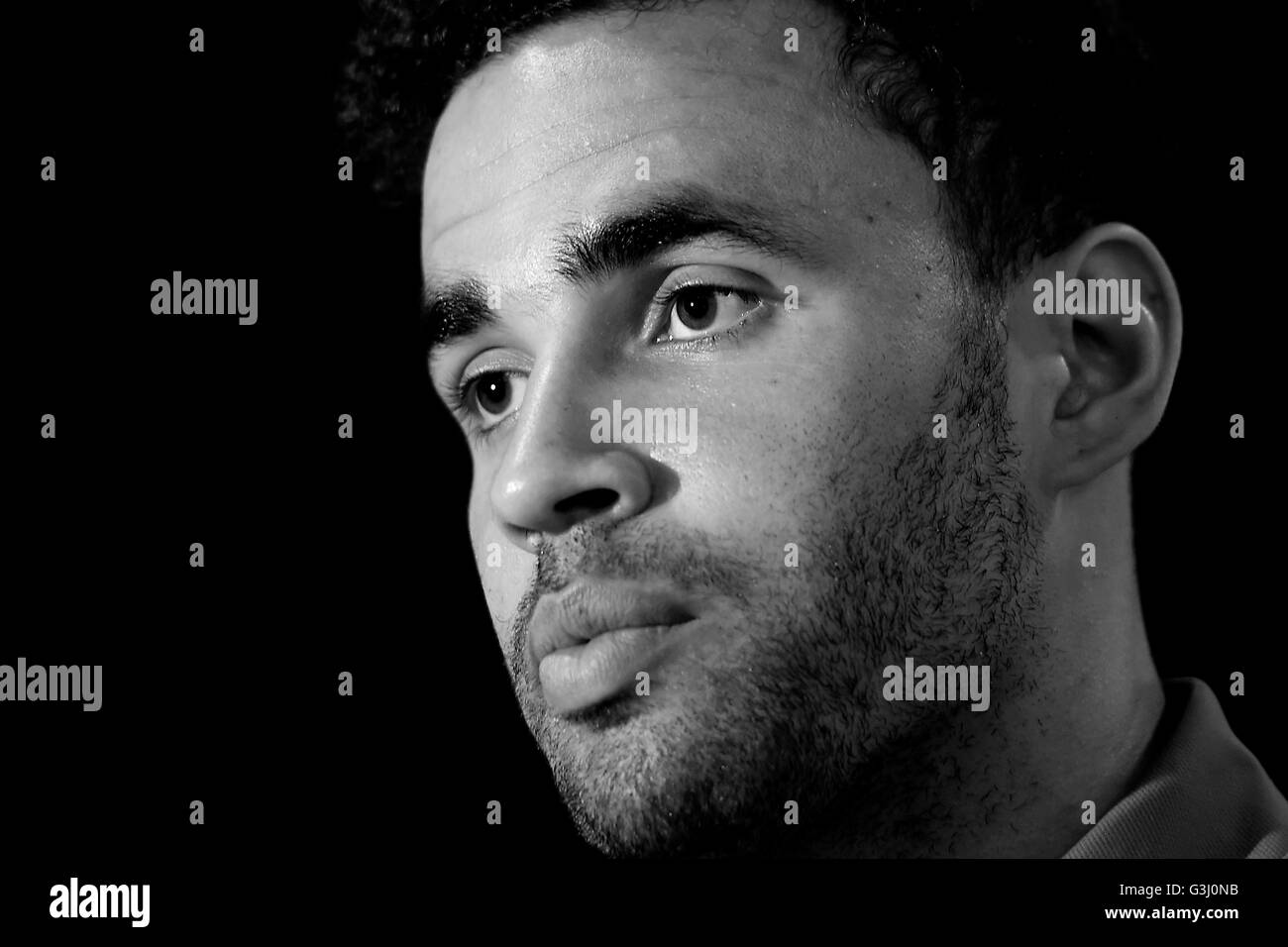 **EDITORS NOTE IMAGE CONVERTED TO BLACK AND WHITE IN POST-PRODUCTION** Wales' Hal Robson Kanu during a press conference at the Wales Media Centre, Complex sportif du Cosec, Dinard. Stock Photo