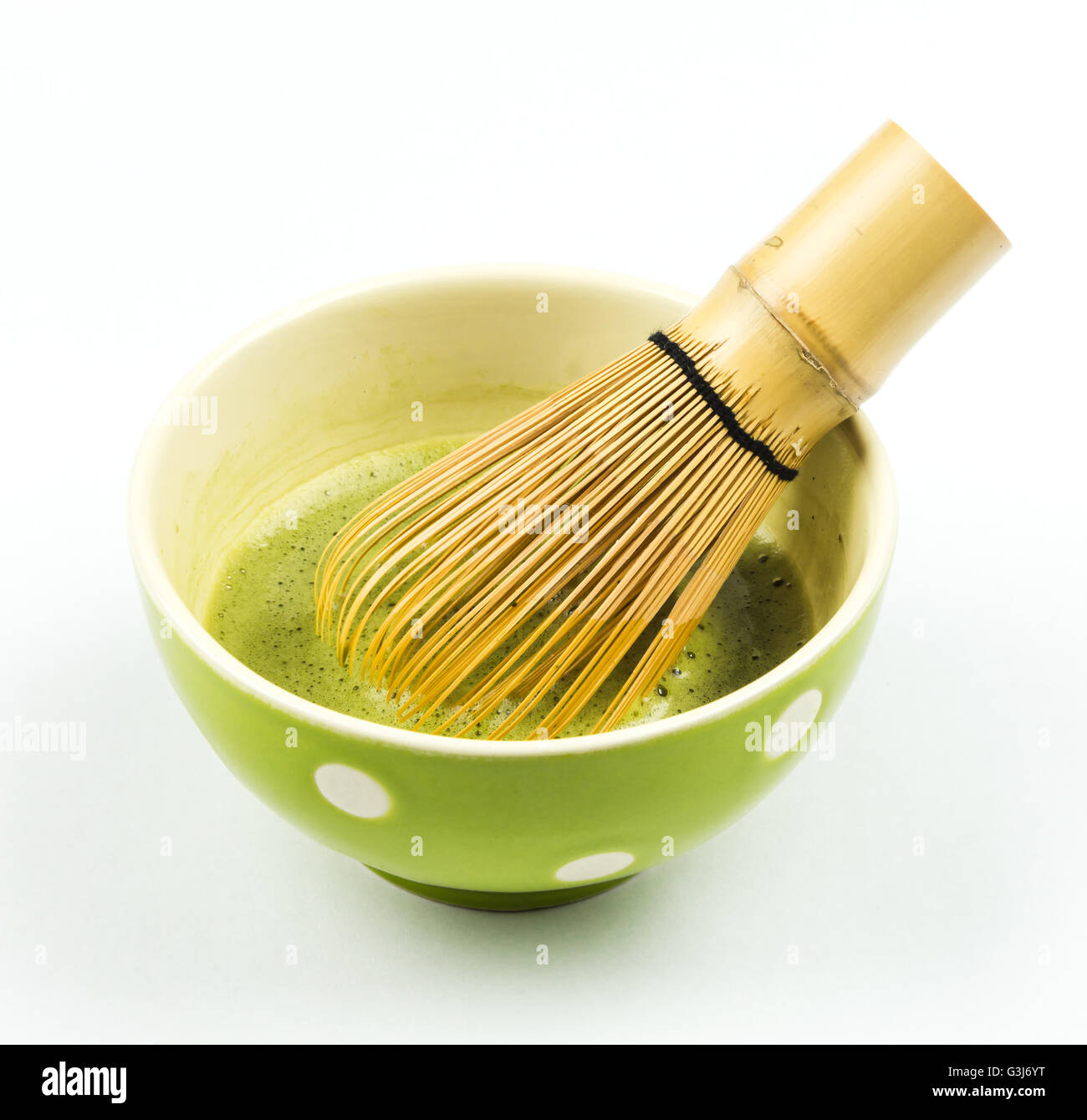 Japanese green tea, green matcha, preparation traditional Japanese green tea. Tea is ready for drinking. Photo is cut out from the original background. Stock Photo