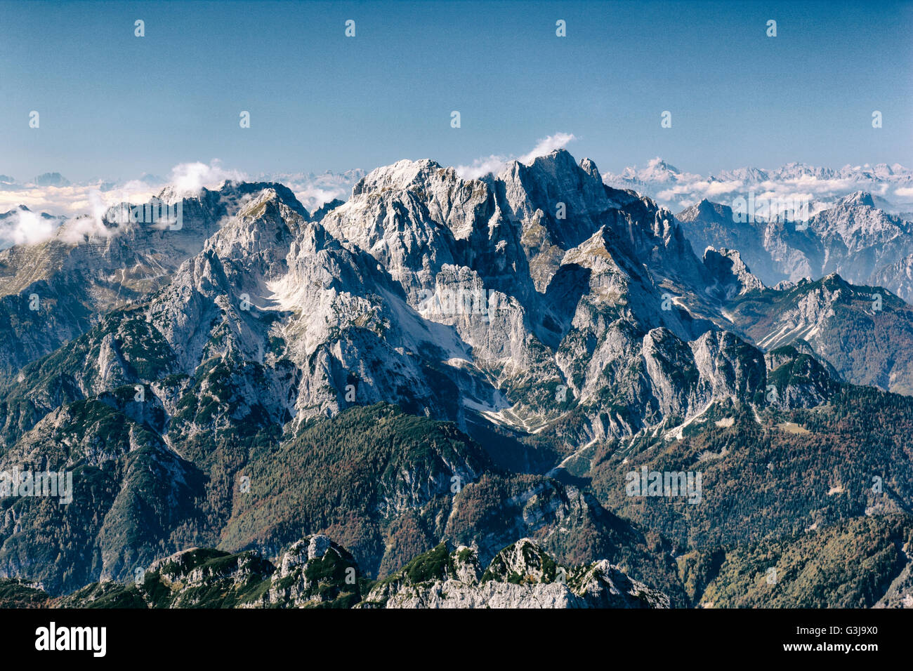 Vintage mountain background. A view from the Mangart mountain top to the alps in Italy Stock Photo