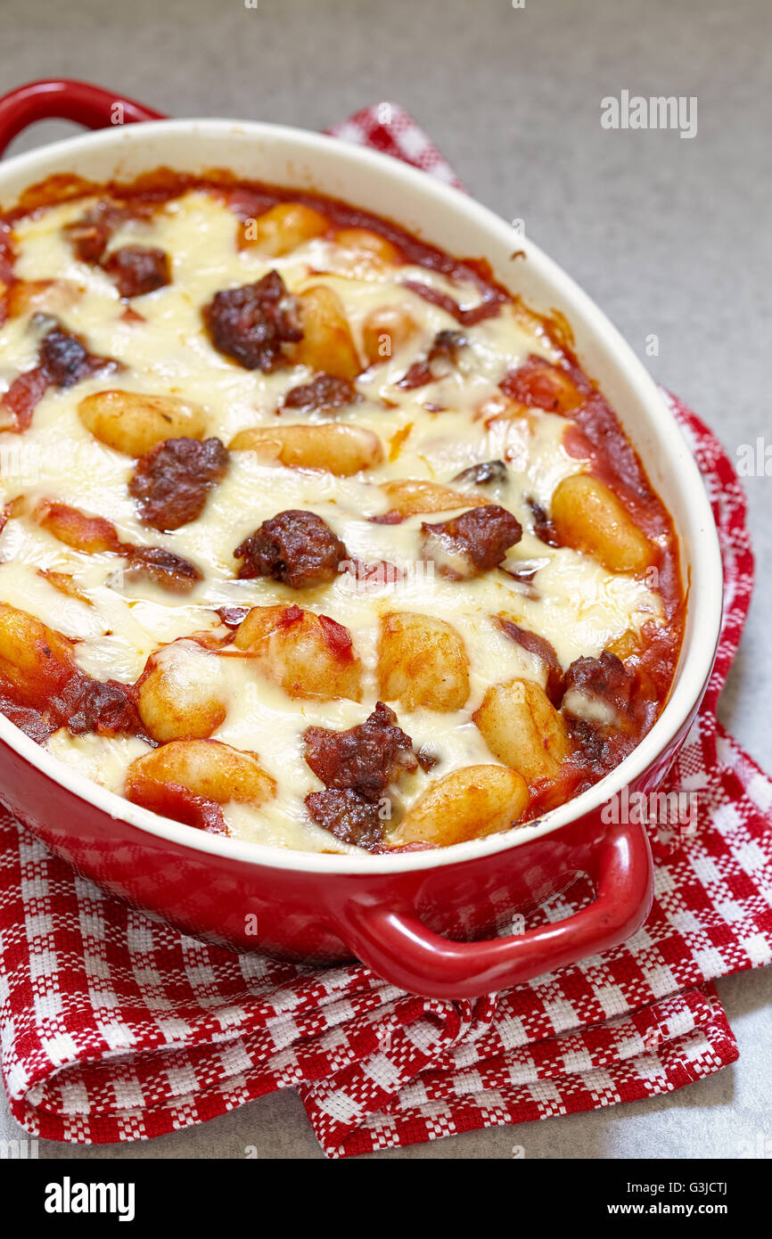 Potato gnocchi with italian sausage and tomato sauce Stock Photo Alamy