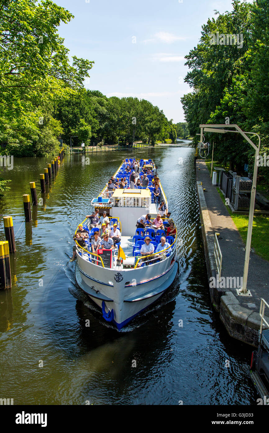 Sightseeing boat on the Landwehr Canal in the channel lock in the Tiergarten district, Berlin, Germany Stock Photo
