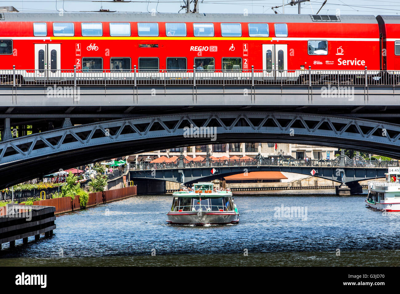 Sightseeing boat on the river Spree, Berlin, Germany, railway bridge, Stock Photo