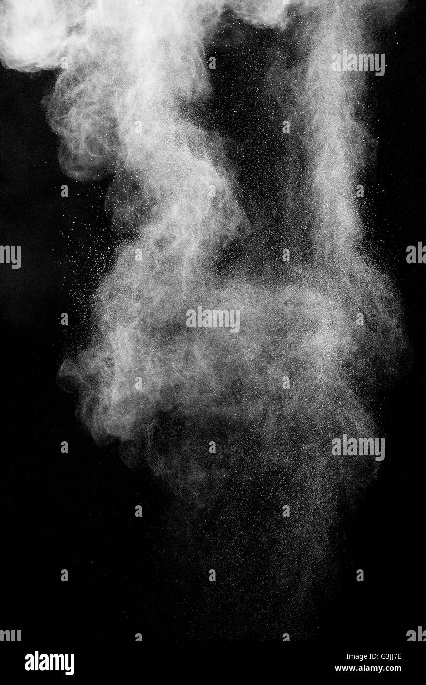 White powder explosion isolated on black background Stock Photo Alamy