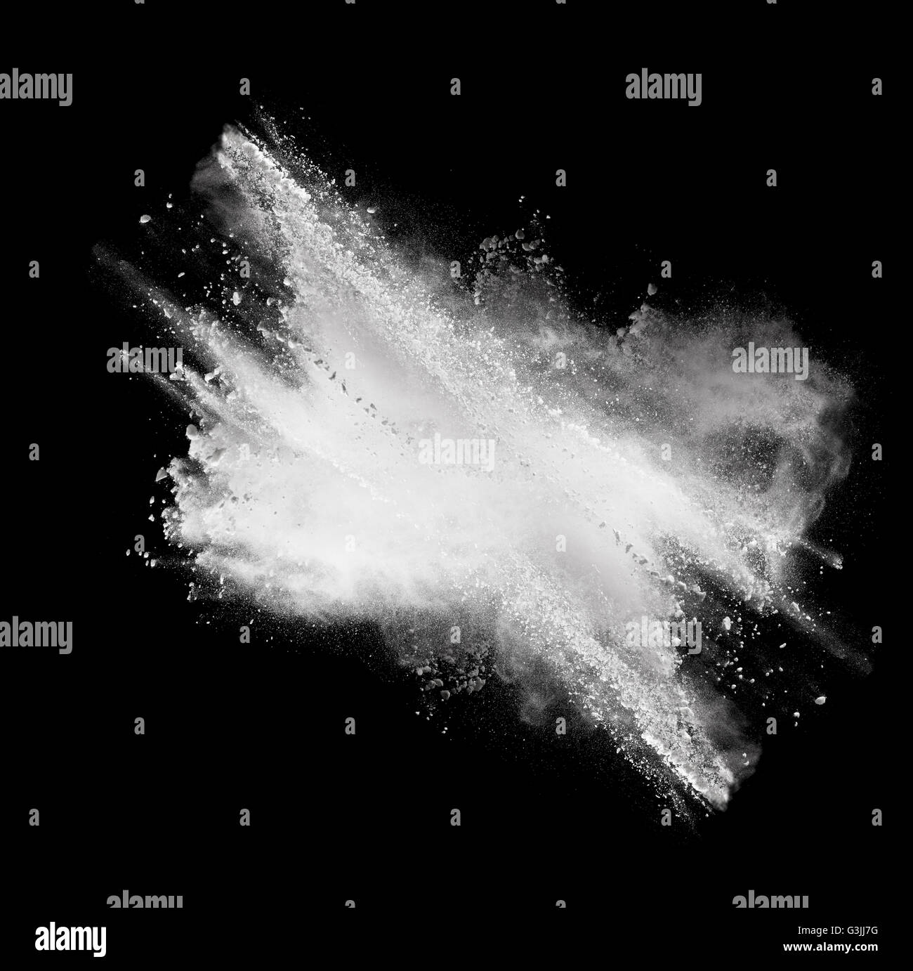 White powder explosion isolated on black background Stock Photo - Alamy